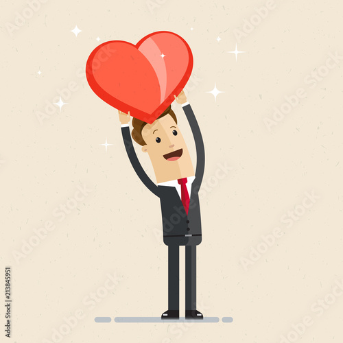 Business man showing a big red heart