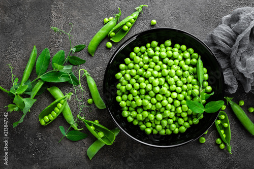 Green peas with pods and leaves