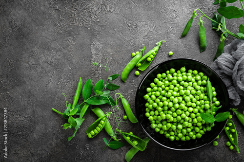 Green peas with pods and leaves