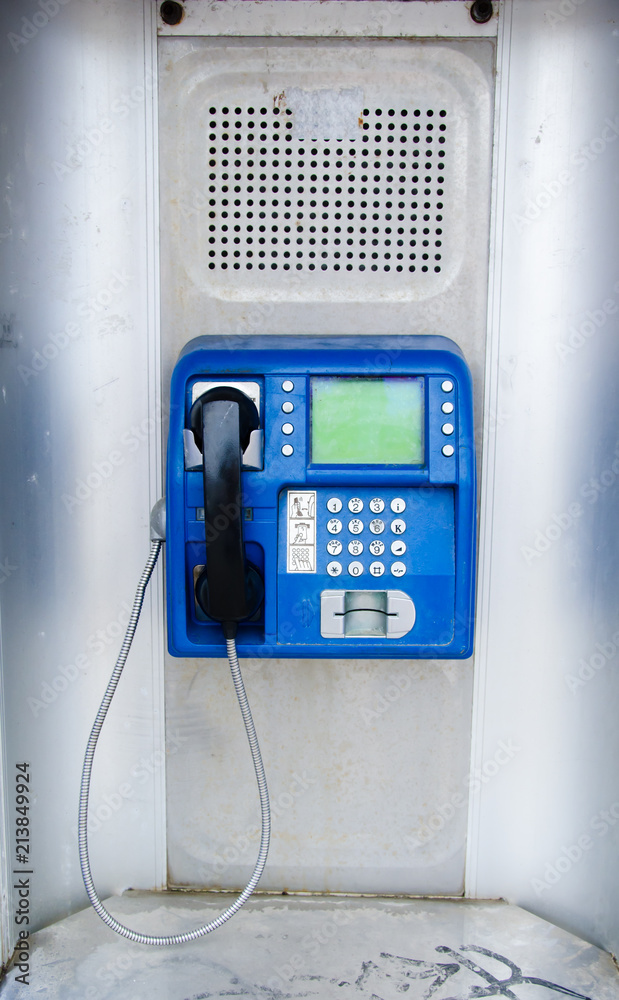 Retro blue gray phone booth box close up, technology of 20th century Retro blue gray phone booth box close up, technology of 20th century