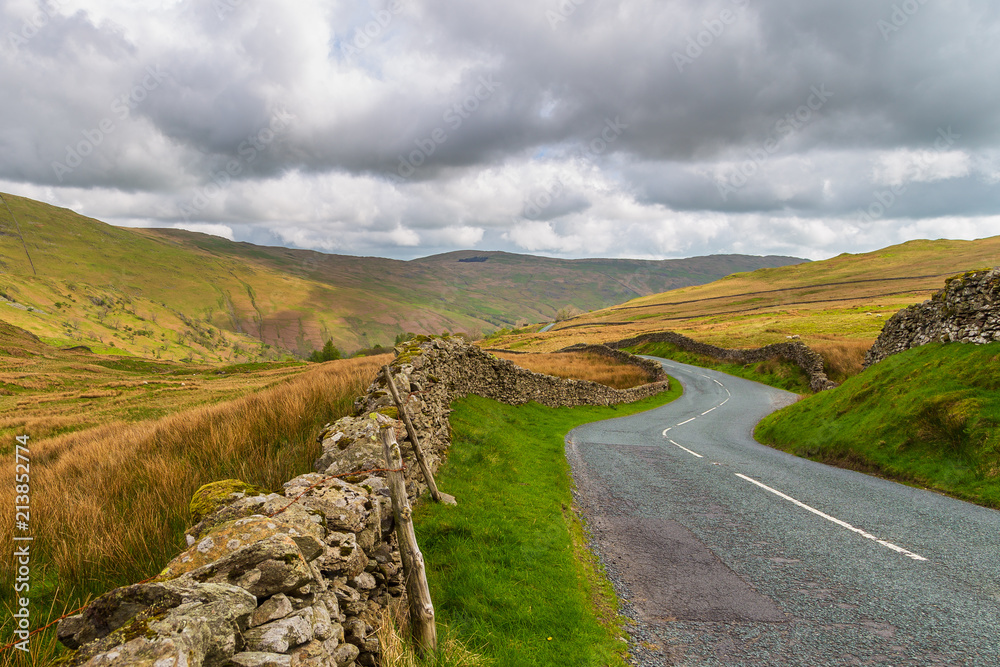 Winding mountain road in The Lake District National Park