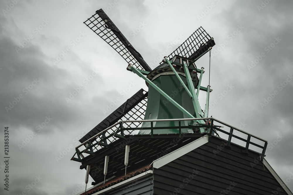 Windmill under dramatic cloudy sky.Holland