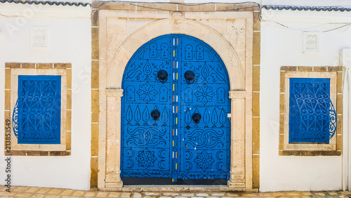 Ornate blue door. Sidi Bou Said, Tunisia photo