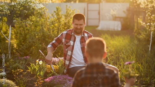 father and son gardening