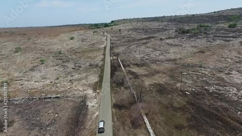 Wallpaper Mural Driving on a barren land | Aerial shot | Fly Through Torontodigital.ca