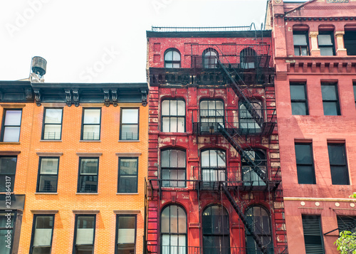 Row of vintage New York City apartment building facades