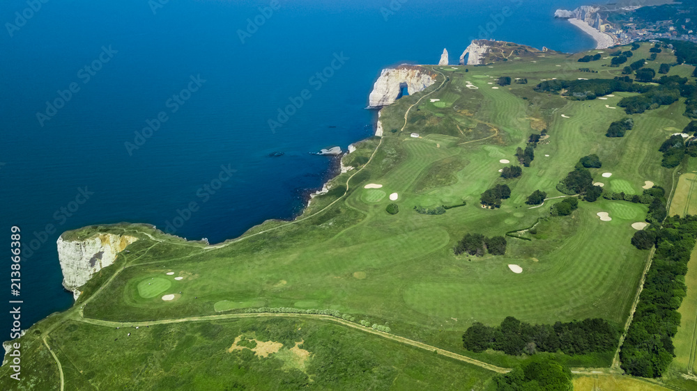 Drone view of a golf course next to the cliffs in Etretat Normandy France  Photos | Adobe Stock