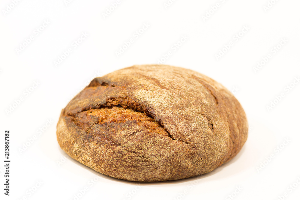 Delicious round rye bread isolated on a white background.Whole fresh healthy baked goods.Useful for vegans Delicious round rye bread isolated on a white background.Whole fresh healthy baked goods.Useful for vegans
