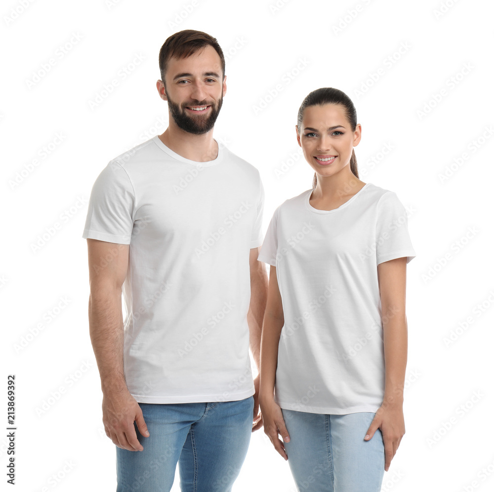 Young couple in t-shirts on white background. Mockup for design Young couple in t-shirts on white background. Mockup for design