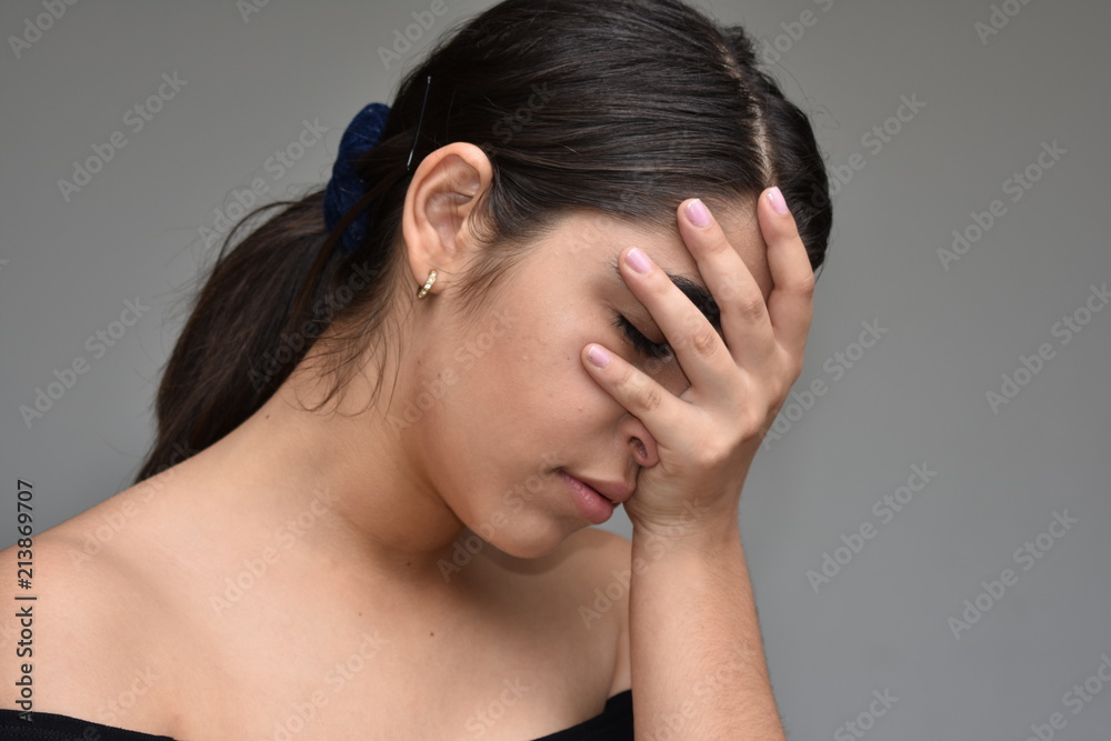 Naklejka premium Unhappy Hispanic Girl
