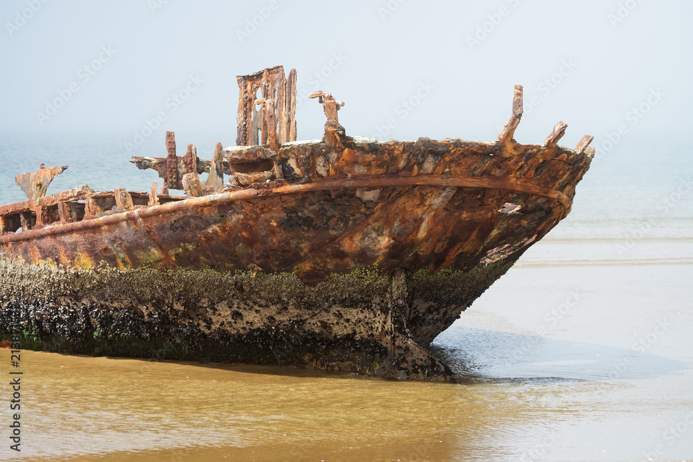 Old rusty shipwreck on the Skeleton Coast, Namibia Old rusty shipwreck on the Skeleton Coast, Namibia