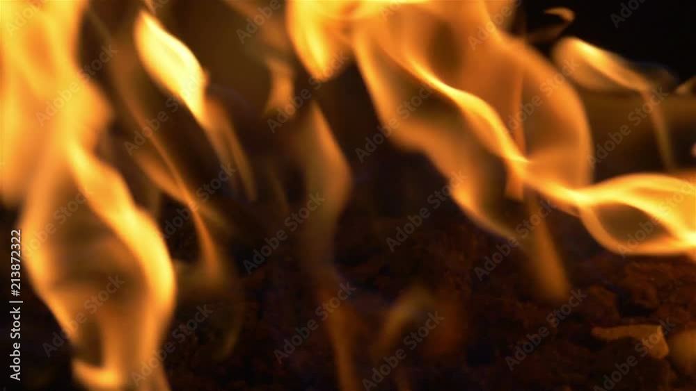 Professional video of fire flames on the darkness in slow motion 180fps Professional video of fire flames on the darkness in slow motion 180fps