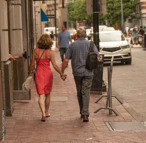 Wallpaper Mural unknown senior couple holding hands for a walk downtown Torontodigital.ca