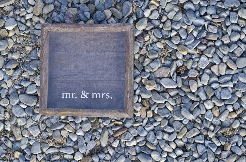 A wooden box frame for the mr and mrs of the new wedding. 