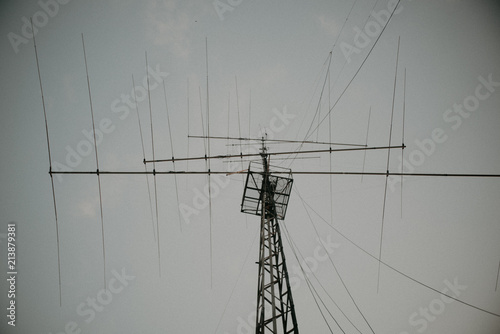 moody telecommunication tower with grunge overlay