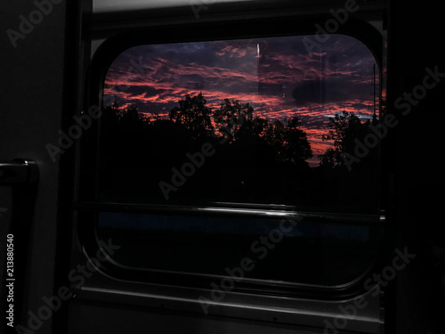 The view from the train window.View of the fiery sunset