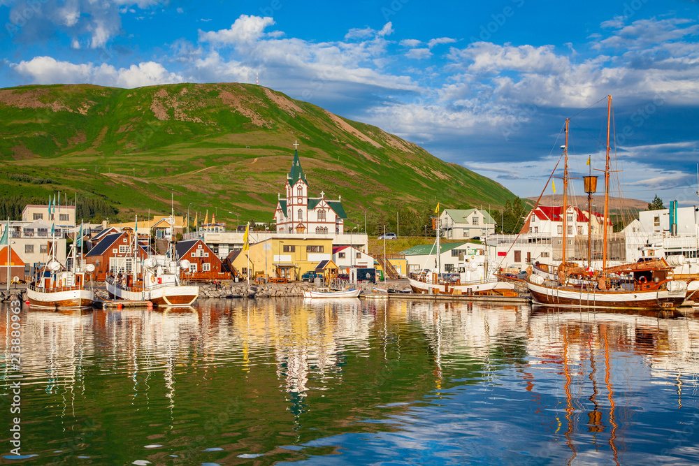 Historic fishing town of Husavik at sunset, Iceland - obrazy, fototapety, plakaty 
