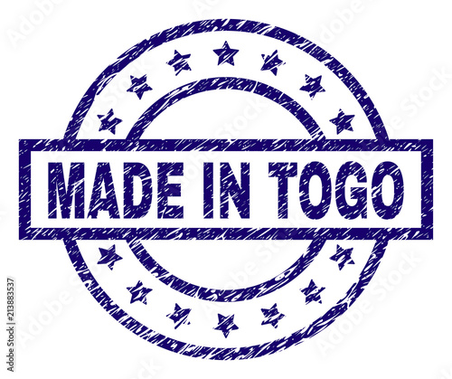 MADE IN TOGO stamp seal watermark with grunge effect. Designed with rectangle, circles and stars. Blue vector rubber print of MADE IN TOGO tag with grunge texture.