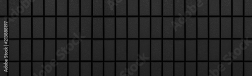 Panorama of Black brick wall pattern and seamless background