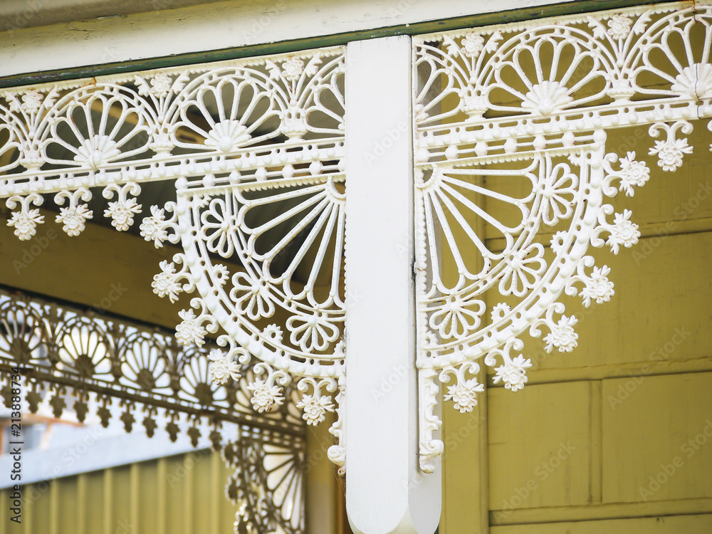 Foto de Victorian Steel Wrought Iron Lacework on Suburban House