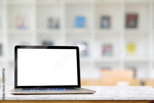 Mockup blank screen laptop with library background. photo