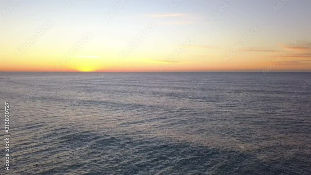 Flying forward in the ocean before the sunrise. Flying forward in the ocean before the sunrise.