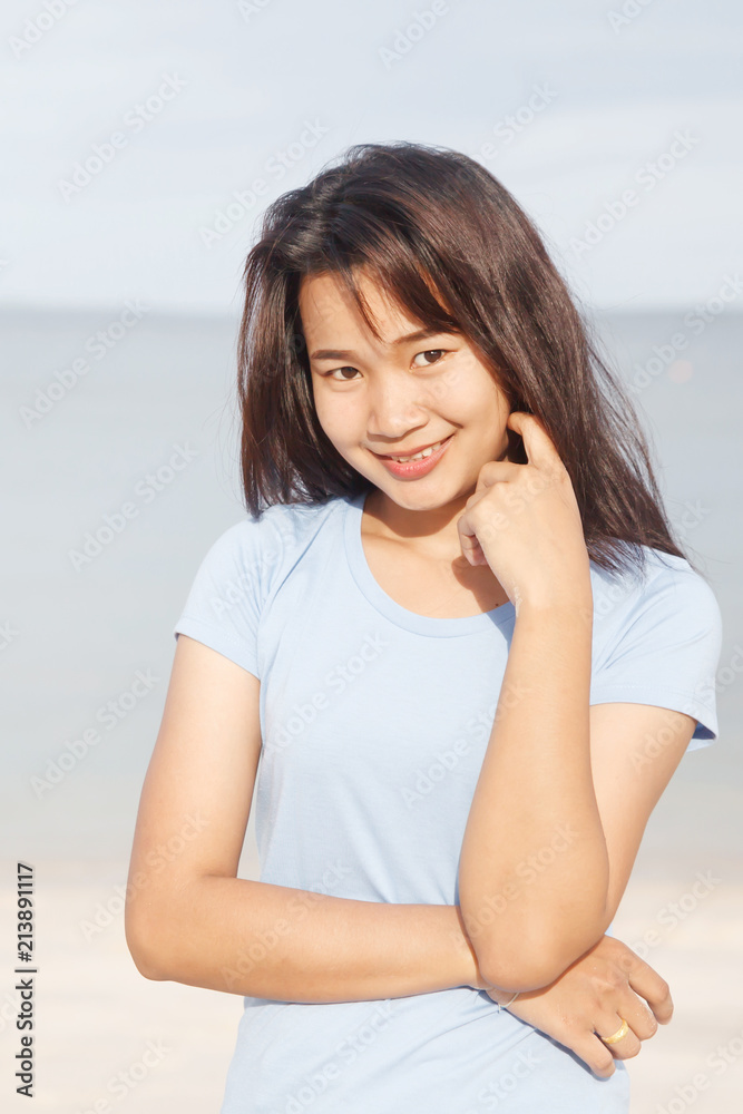Young woman on the beach. Young woman on the beach.