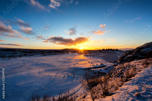 Sunset on icelandeic tundra with snow and ice © dade72