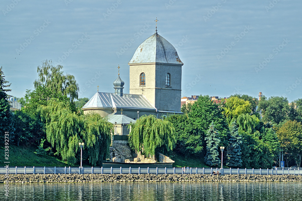 The church over the pond is an ancient in Ternopil, Ukraine.