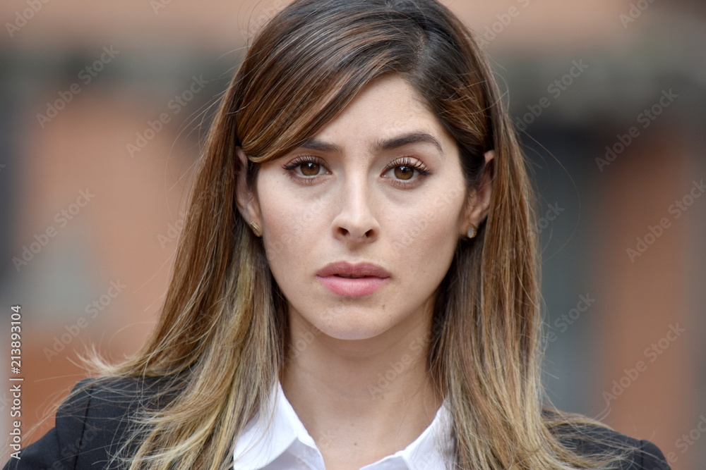 Obraz premium Unemotional Colombian Business Woman