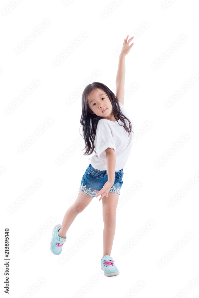 Young asian girl dancing over white background Young asian girl dancing over white background