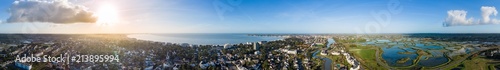 Drone panorama of La Baule Escoublac with seaside, beach and salt marshes.