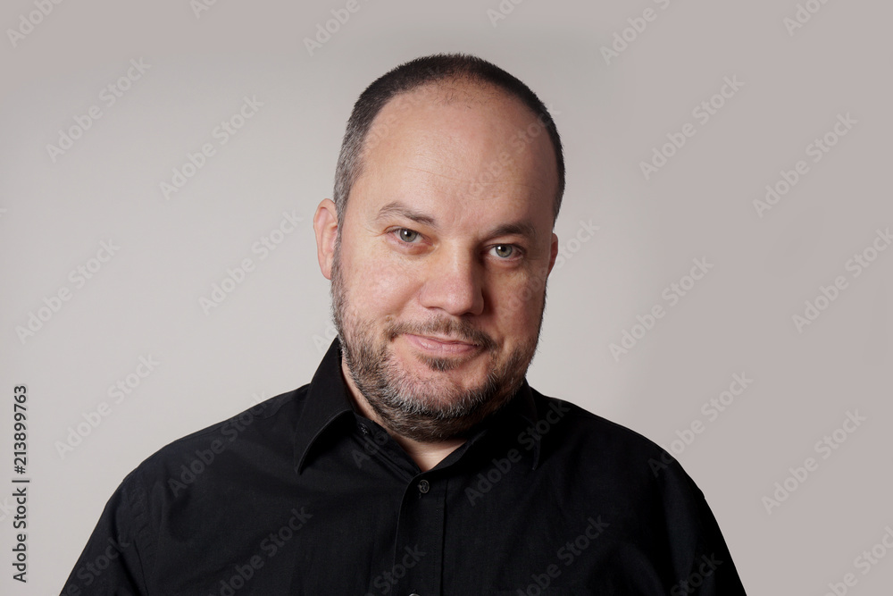 middle aged man in his forties with friendly expression middle aged man in his forties with friendly expression