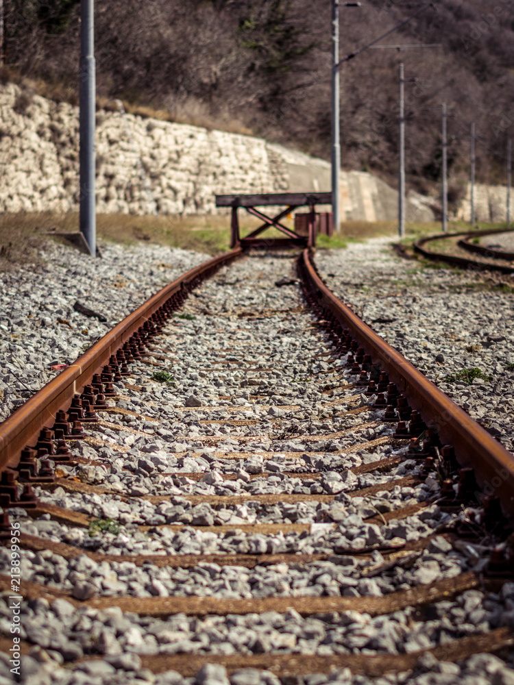 Industrial view of dead end railway track. Wooden sign at the end of the  rail trail. Concept for end,border and limitation. Stock Photo | Adobe Stock