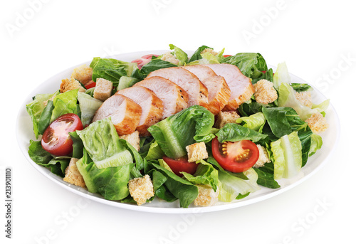 Fototapeta Caesar salad with chicken fillet isolated on white background.