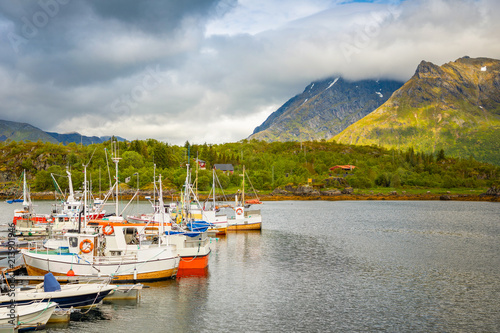 Fishing boats on moutain background in Lofoten island, Norway