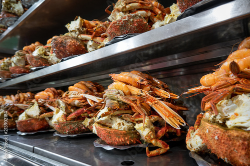Seafood platter in a row prepared to be served photo