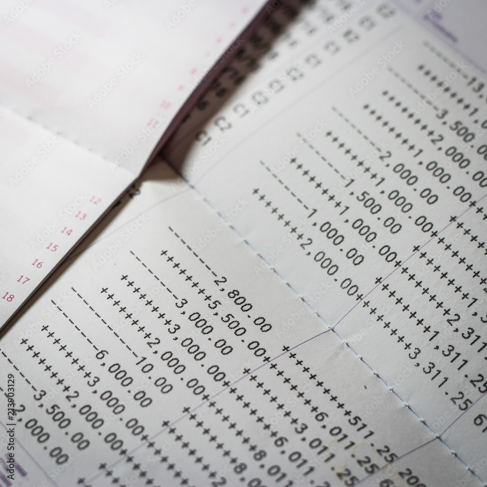 bank account. Close up financial report statement monthly book bank account passbook saving money bank account. Close up financial report statement monthly book bank account passbook saving money