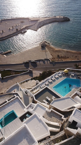 Aerial drone photo of famous resort in Cavo Tagoo famous for number of pools in new public port of Mykonos island, Cyclades, Greece