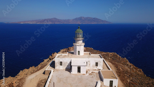 Aerial drone bird's eye view photo of iconic lighthouse in area of Armenistis with stunning views to the Aegean