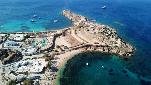 Aerial drone bird's eye view from famous beach of Paraga featuring famous night club of Skorpios and Santanna with largest pool in Europe and Skorpios beach, Mykonos island, Cyclades, Greece photo