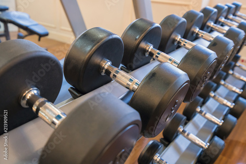 dumbbells in the gym at sports club for exercise and Bodybuilding