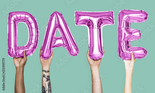Pink alphabet balloons forming the word date