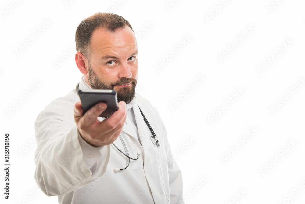 Portrait of male doctor handing the smartphone Portrait of male doctor handing the smartphone