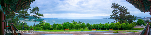 Panorama sea view of Admiral Yi Sun Sin memorial park in Geoje island, South Gyeongsang Province, South Korea. View from old Korean style pavilion.