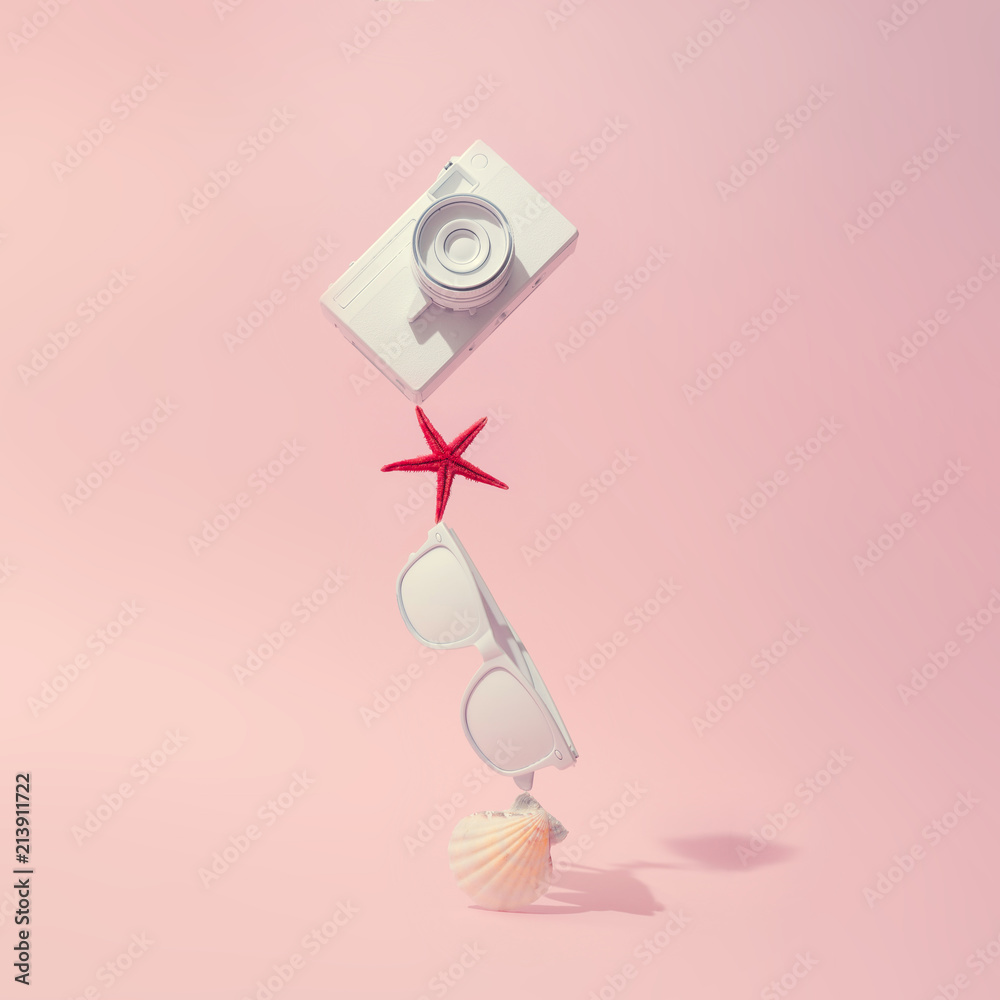 Beach accessories and on pastel pink background with copy space. Summer is coming concept. Minimal flat lay. Beach accessories and on pastel pink background with copy space. Summer is coming concept. Minimal flat lay.