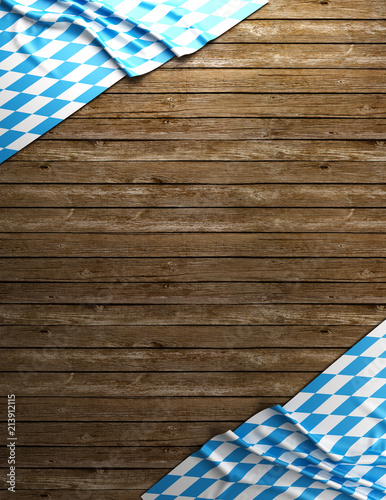 Rustic background for Oktoberfest with bavarian white and blue fabric on wooden - 3D rendering