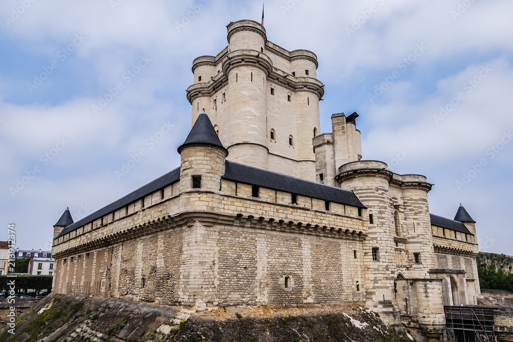 External view of Vincennes Castle (Chateau de Vincennes) - massive XIV - XVII century French royal fortress in the town of Vincennes, to the east of Paris. France.