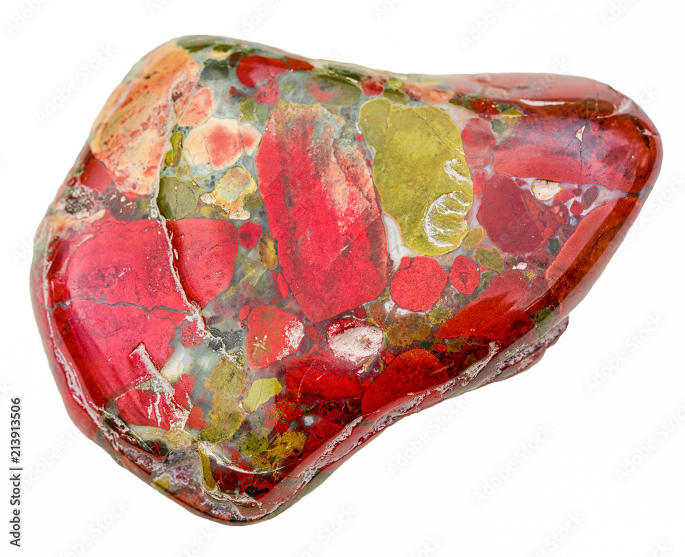 macro shooting of natural mineral stone small pebble of red and