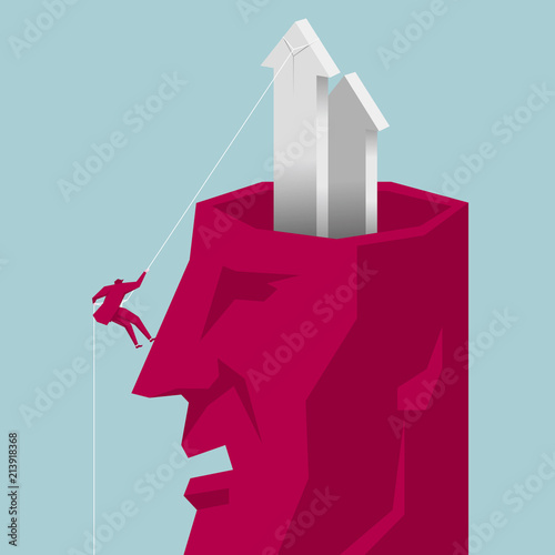 Businessman rock climbing from the head. The background is blue.